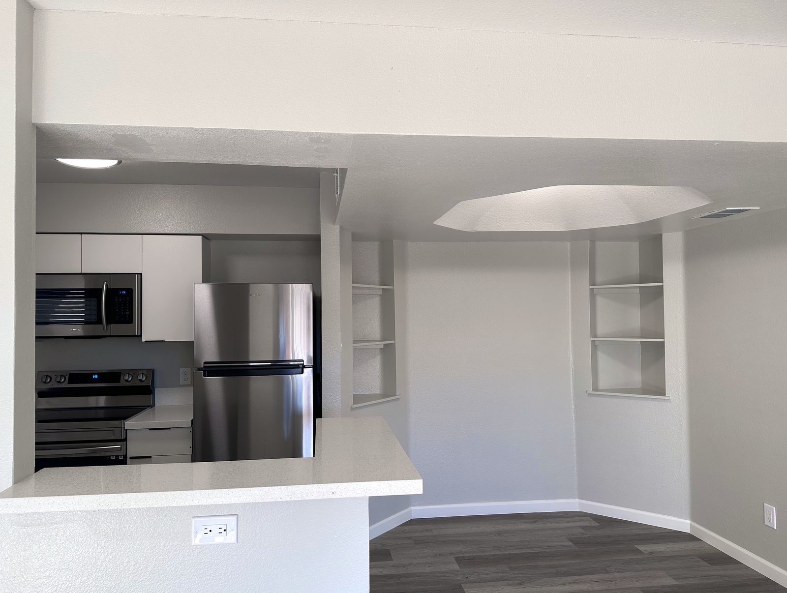 Living room and kitchen, unfurnished